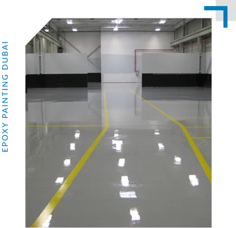 gray industrial epoxy floor with bright yellow safety lines