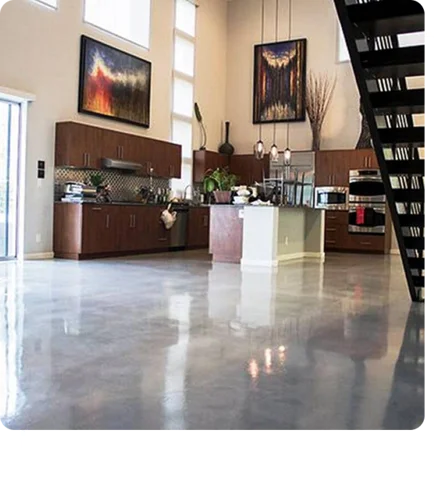 Luxury open-concept home interior with seamless, high-shine residential epoxy flooring and dark wood cabinetry