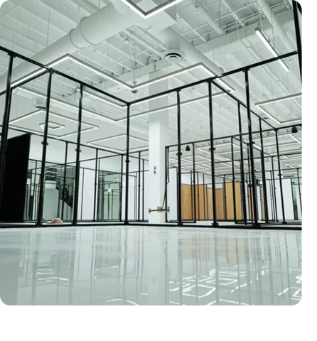 white epoxy floor in a modern, open plan office