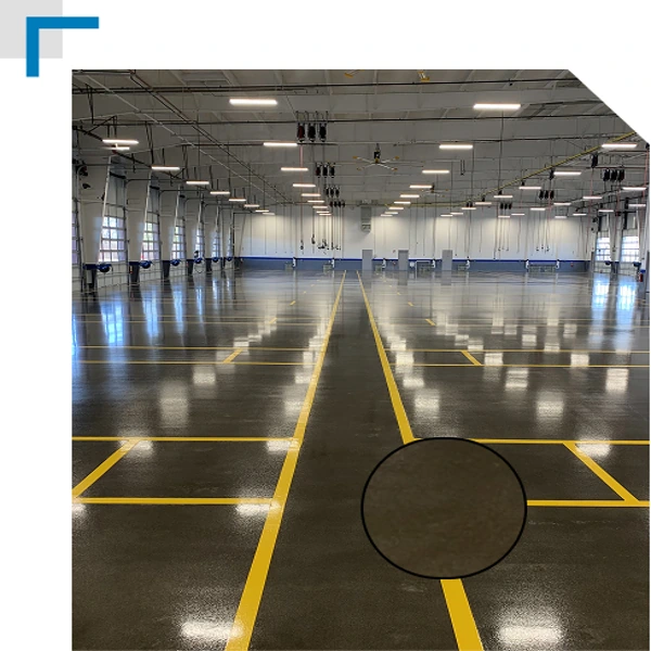 industrial workspace showcasing our high-durability concrete epoxy flooring with precision safety zones.